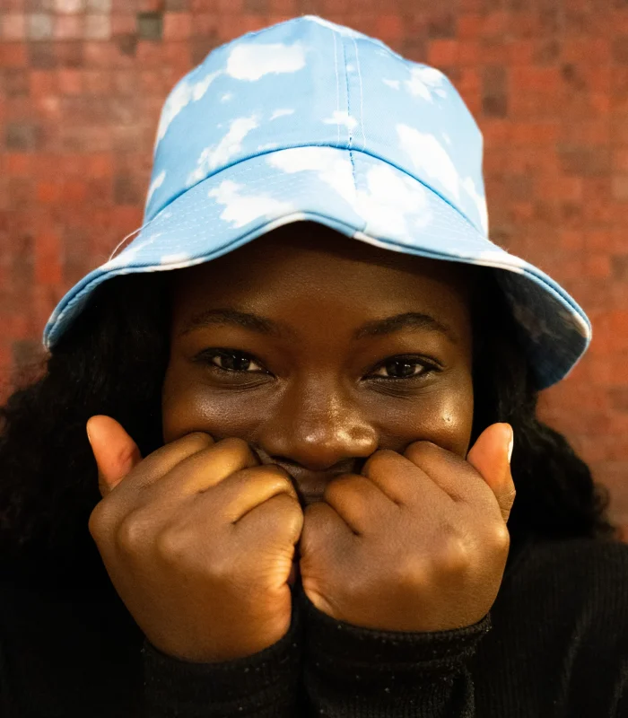 instagram-photo-shoot-with-an-exited-woman-wearing-a-blue-hat